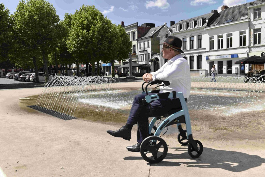 Man taking a rest in a rollator while sightseeing